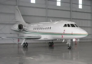 Detailed exterior polish of a private jet at Appleton Car Wash, showcasing a high-gloss finish.