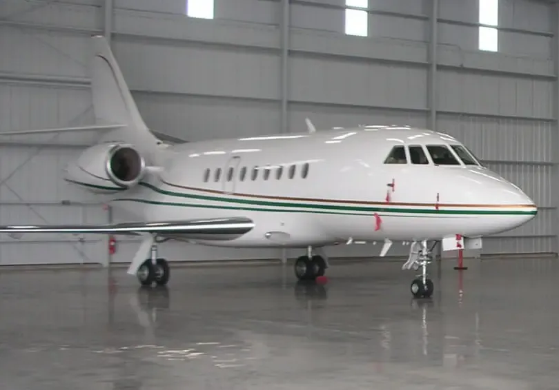 Detailed exterior polish of a private jet at Appleton Car Wash, showcasing a high-gloss finish.
