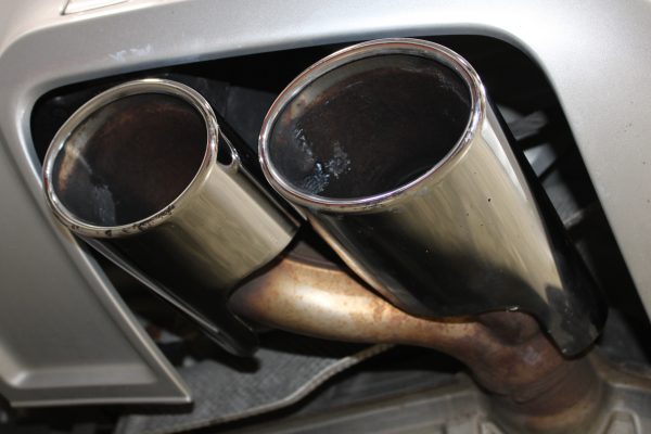 Polished exhaust tip shown from the side view