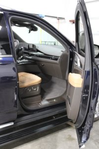 Ultimate Gloss: Spotless, polished interior of a Cadillac SUV after professional detailing.