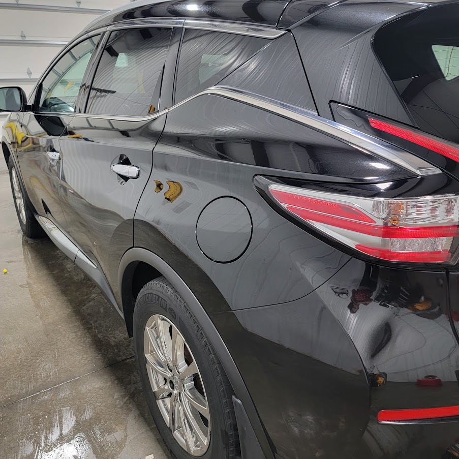 Second view of vehicle exterior detailing with a waxed and shiny surface in Appleton, WI.