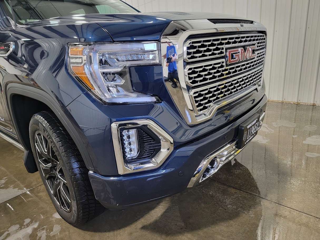 Shiny truck front view, ceramic-coated with a restored glossy finish on the driver's side.