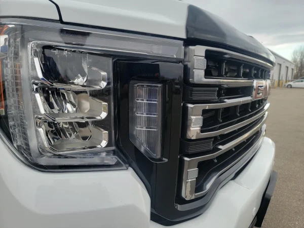 Shiny GMC truck after complete exterior detail and hand wax in Appleton, WI.